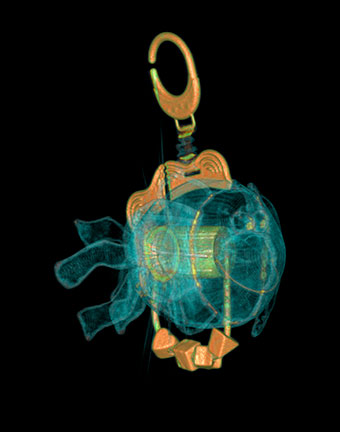 Illustration for article titled CT Scanner Bares Apple Notebook, PS3, and Big Mac to Their Core